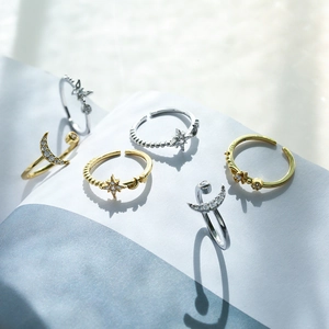 Adjustable celestial rings with star and moon zircon accents in gold and silver plating
