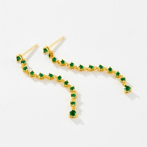 Elegant long gold tassel earrings for women featuring sparkling green zircon gemstones