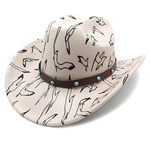 Detail of western cowboy hat with flying bird print and turquoise beaded leather band