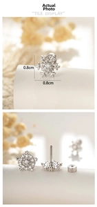 Detailed view of silver snowflake stud earrings with 0.8cm diameter and screw back design