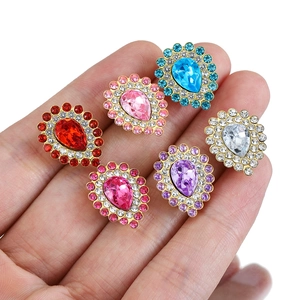 Hand-held glass teardrop rhinestones with metal claw settings in six vibrant colors