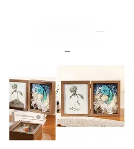 Deep wood double frame featuring dried blue hydrangea and roses in a 3D shadow box