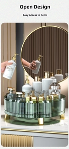 Macro shot of dark green spinning organizer showing cosmetic storage and gold metal legs