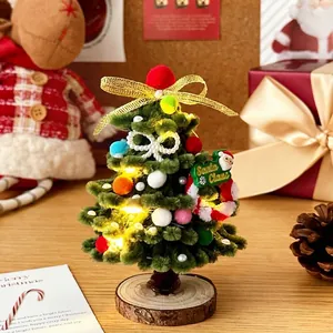 Handmade DIY Christmas tree kit with green pipe cleaners, LED lights, and wooden base