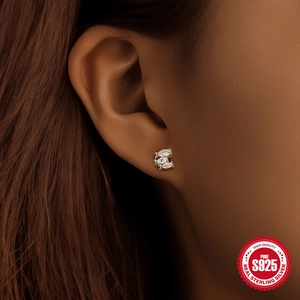 Elegant S925 sterling silver marquise zircon fish studs earrings worn by a female model