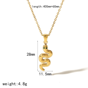 Gold stainless steel snake pendant necklace with green gemstone eyes and sizing details