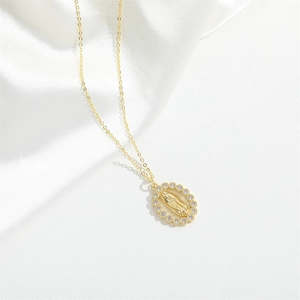 French vintage style gold oval pendant necklace featuring Virgin Mary relief and zircons