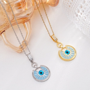 Collier plaqué or 18 carats avec pendentif œil turc et motif rayon de soleil