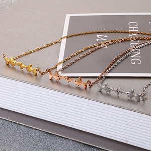 Minimalist aircraft and heartbeat line necklaces in gold, rose gold and silver