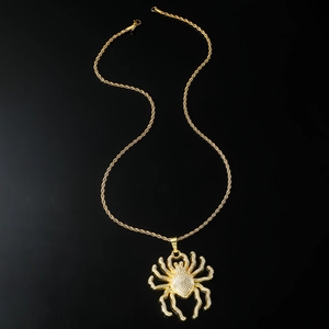 Gold-tone hiphop necklace featuring a sparkling diamond-encrusted spider pendant on a rope chain