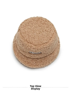 Detailed top view of a beige lamb wool bucket hat with soft plush faux fur texture