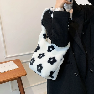 Cute black and white floral plush shoulder bag with a soft faux fur texture for women
