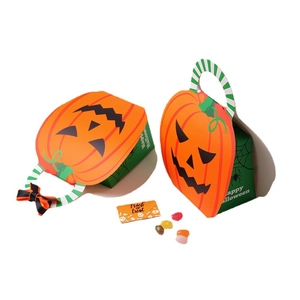 Halloween pumpkin-shaped gift boxes with handles and 'Happy Halloween' greeting