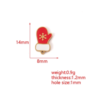Detail of a Christmas glove pendant in red enamel with golden snowflake and measurements