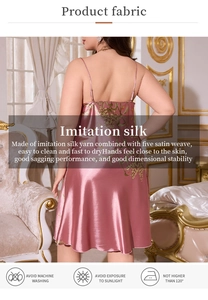 Detail of pink floral faux silk nightgown showing satin weave texture and back design
