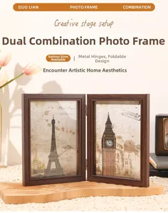 Detail of walnut wood double folding photo frame with metal hinges in a cozy home setting