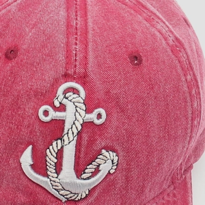 Washed vintage red baseball cap featuring a 3D embroidered white nautical anchor design