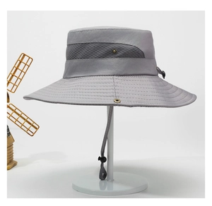 Close-up of grey sun hat featuring mesh vents and adjustable chin strap for outdoor use