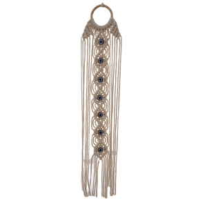 Macrame wall hanging with blue evil eye beads and tassels on a wooden ring