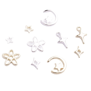 Miniature star and moon alloy nail art charms in silver and gold finish for DIY