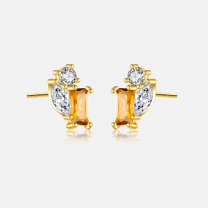 Detail of S925 silver gold-plated stud earrings with yellow stone and zircon accents