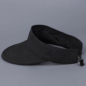 Detail of black breathable mesh fabric and adjustable drawstring on sports sun visor