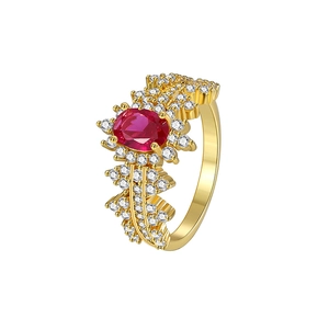 French-style gold floral ring with oval red gemstone and pavé white zircons