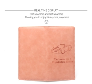 Close-up of pink leather car insurance holder with debossed sports car pattern