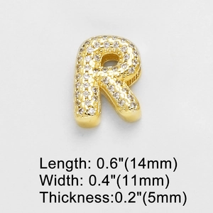 Macro shot of gold-plated letter R charm with pavé cubic zirconia and dimension details