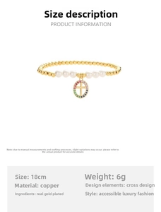 Detail of beaded bracelet with gold copper beads, white pearls and a colorful cross pendant