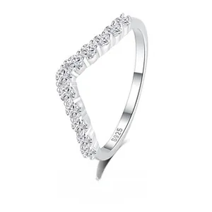 Detailed close-up of S925 sterling silver stamp and sparkling zircons on chevron ring
