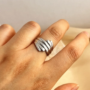 Minimalist silver pleated texture stainless steel ring with elegant metallic luster finish