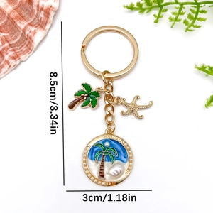 Golden starfish and coconut tree keychain with pearl shell pendant, length 8.5cm