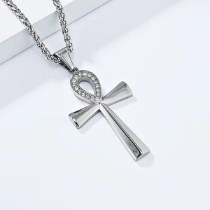 Detail of silver Ankh cross pendant with clear cubic zirconia on wheat chain