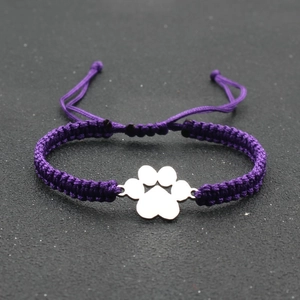 Handmade purple woven rope bracelet featuring a silver paw print charm for women