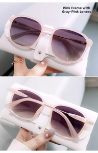 Pink oversized gradient sunglasses with a premium white pebbled leather case and frame detail