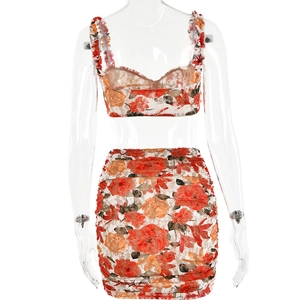 Back view of floral mesh two-piece set with rose prints and ruched details