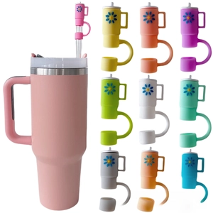 Detail view of colorful flower silicone straw covers compatible with 40oz tumblers
