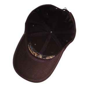 Inside view of a coffee brown cotton baseball cap showing adjustable strap and inner seams