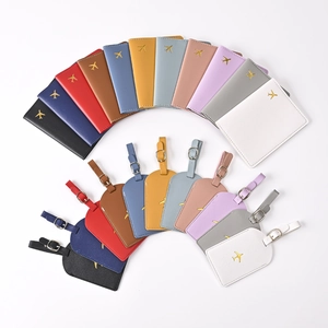 Colorful PU leather passport covers and luggage tags with gold airplane embossing