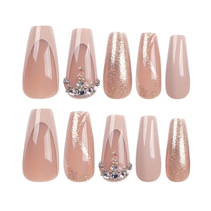 French glitter press-on nails in long ballerina shape with pink base and rhinestones