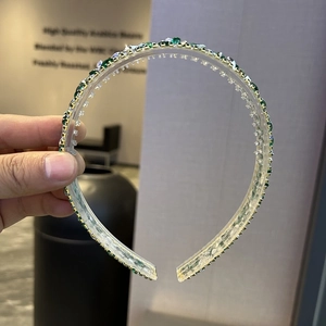Baroque crystal headband with green and clear rhinestones on transparent base