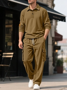 Detail of khaki corduroy texture on men's long sleeve polo and cargo pants set