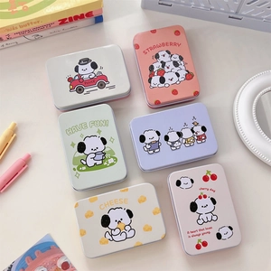 Detail of six rectangular metal storage boxes featuring cute cartoon dog illustrations
