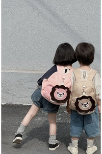 Pink and khaki toddler lion backpacks featuring 3D cartoon design on kids' backs