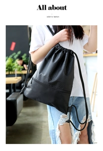 Detail of waterproof nylon drawstring backpack with honeycomb texture and side zipper pocket