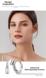 Detailed view of sterling silver hoop earrings with white moissanite and thick plating
