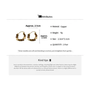 Detail view of retro square faux tiger eye earrings with 18k gold plated copper beads