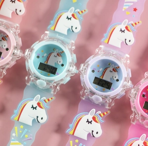 Colorful unicorn kids digital watches with 3D silicone straps in blue and pink tones