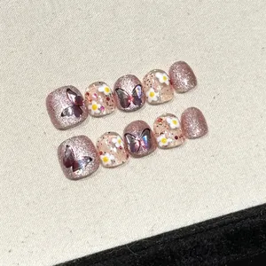 Handmade glitter press-on toenails for girls with butterfly and white flower designs